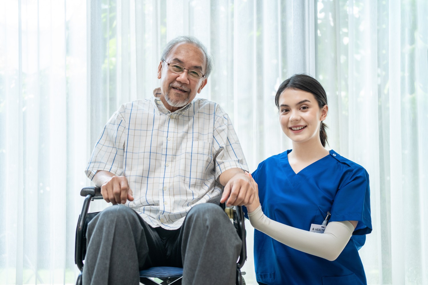 Happy elderly person enjoying companionship and social engagement with non-medical caregiver