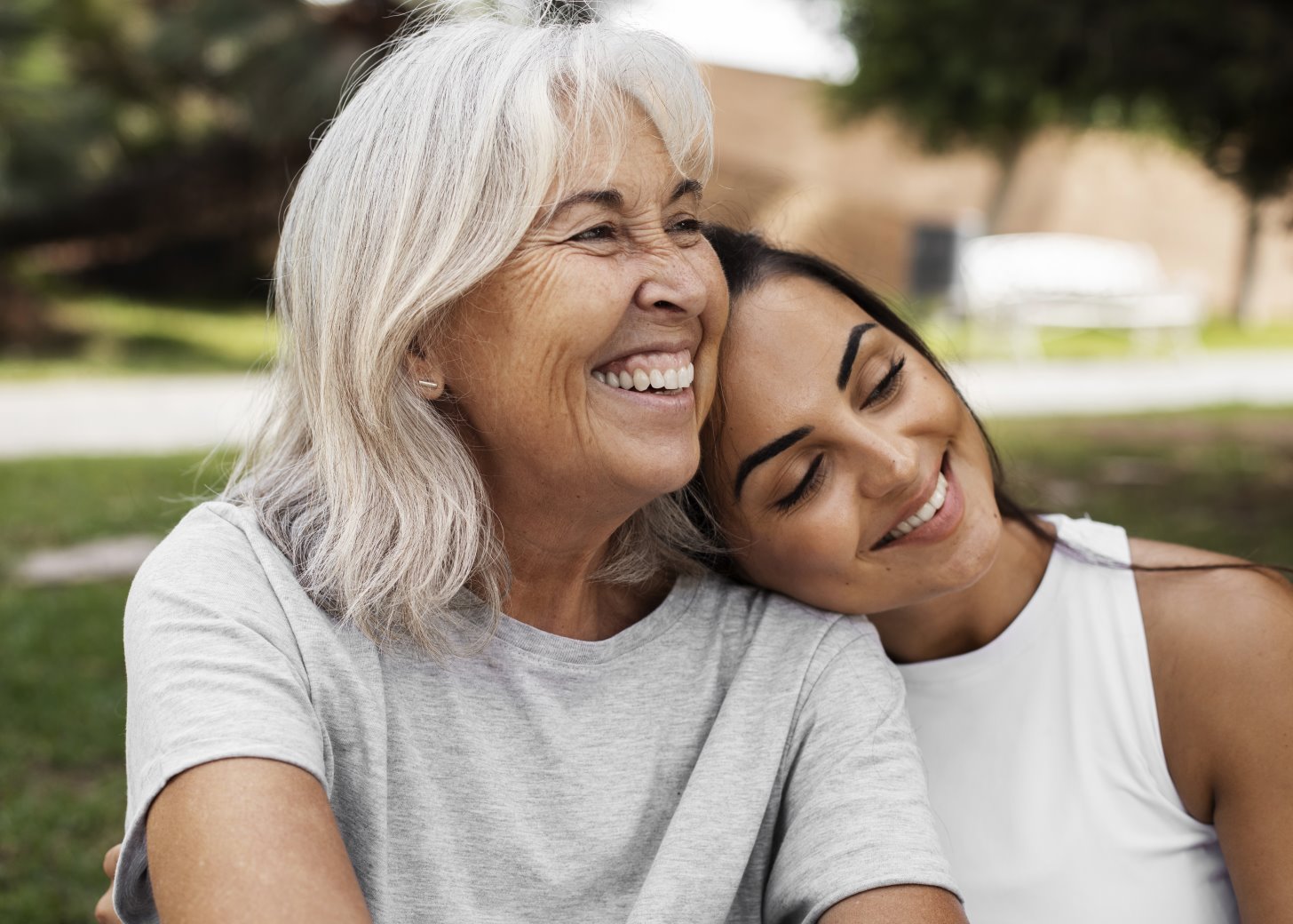 portrait-two-female-friends-with-different-ages-outdoors